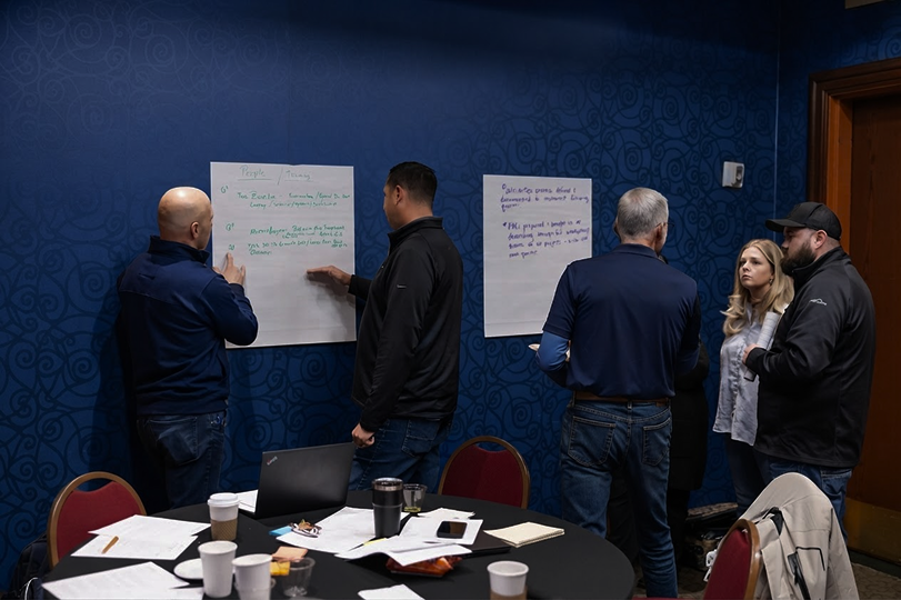 Cobalt team members gathered and collaborating