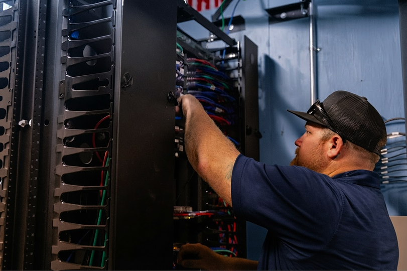 technician working in circuit room