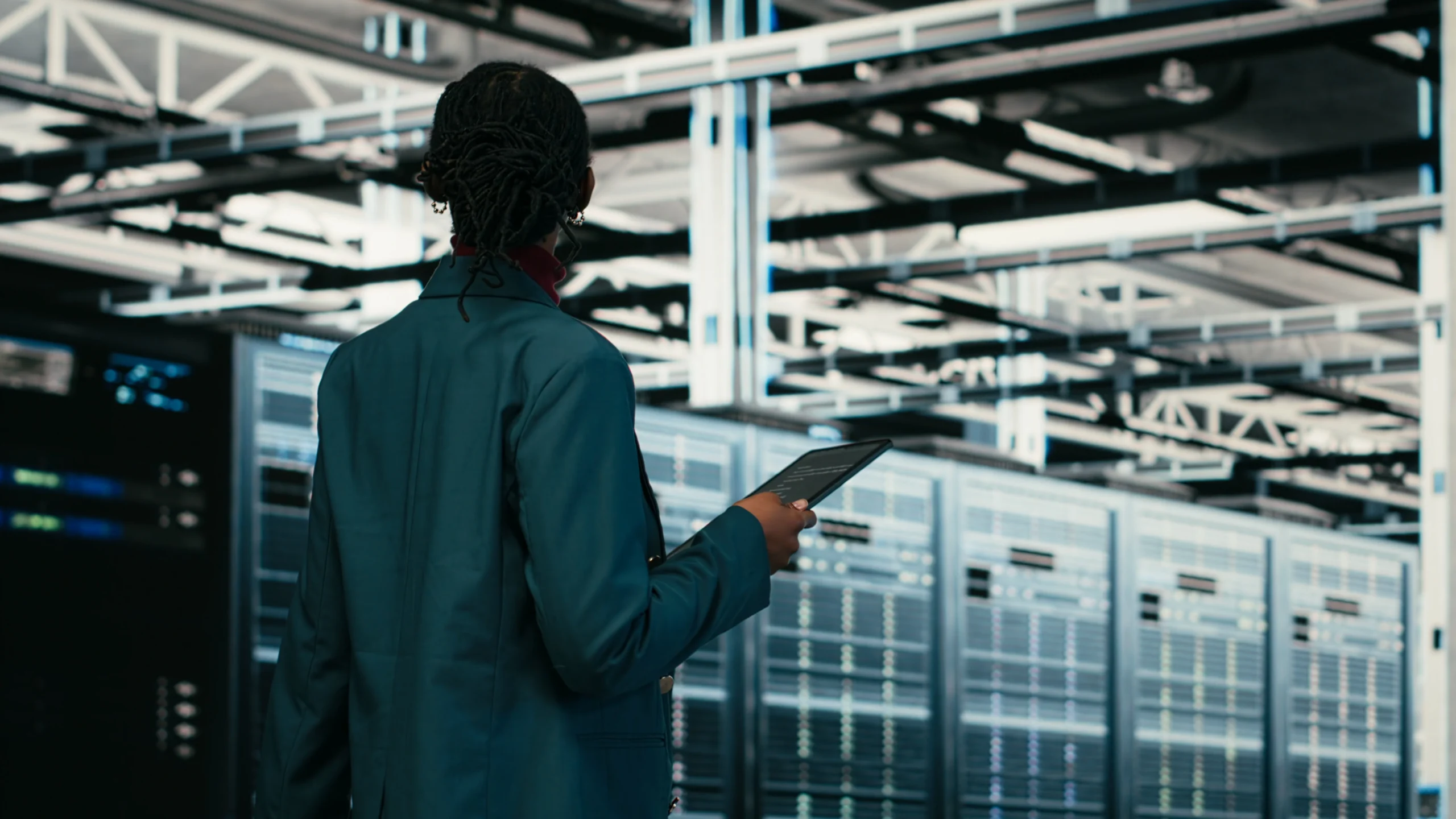 employee walking through data center